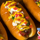 Illustration for article titled The Sonoran hot dog brings the U.S. and Mexico together in a bolillo roll